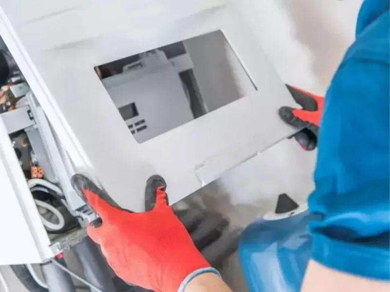 removing a tankless water heater cover