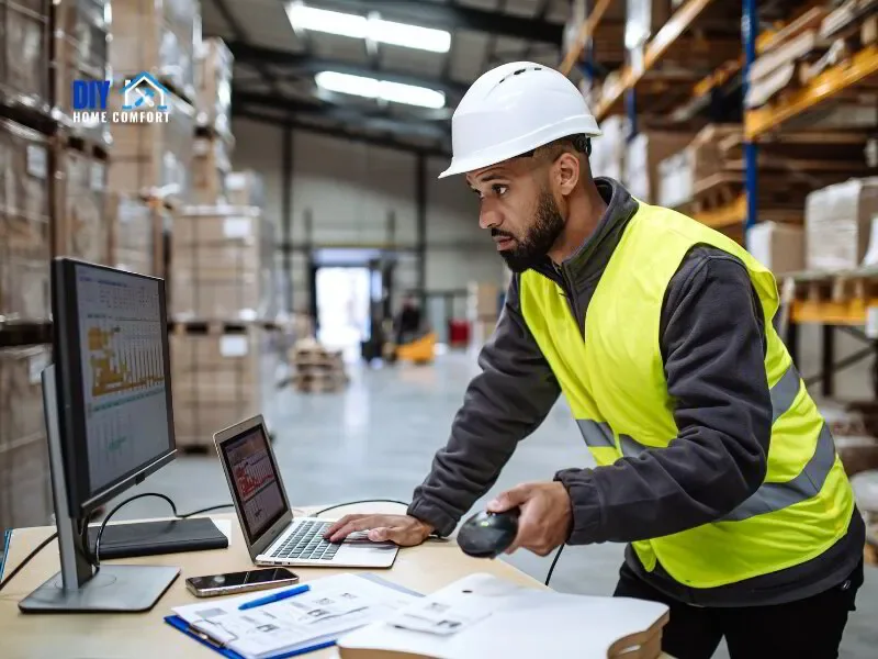 Warehouse worker using construction software